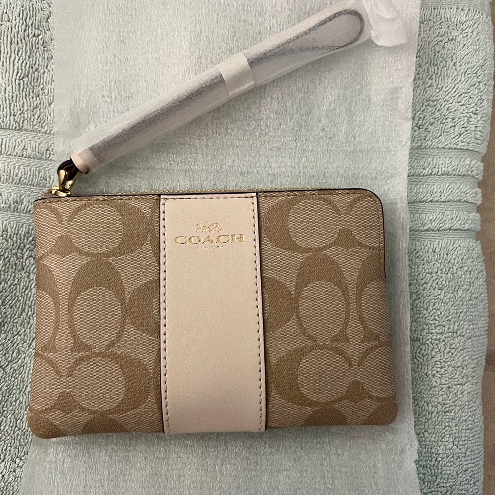 Coach cream wristlet